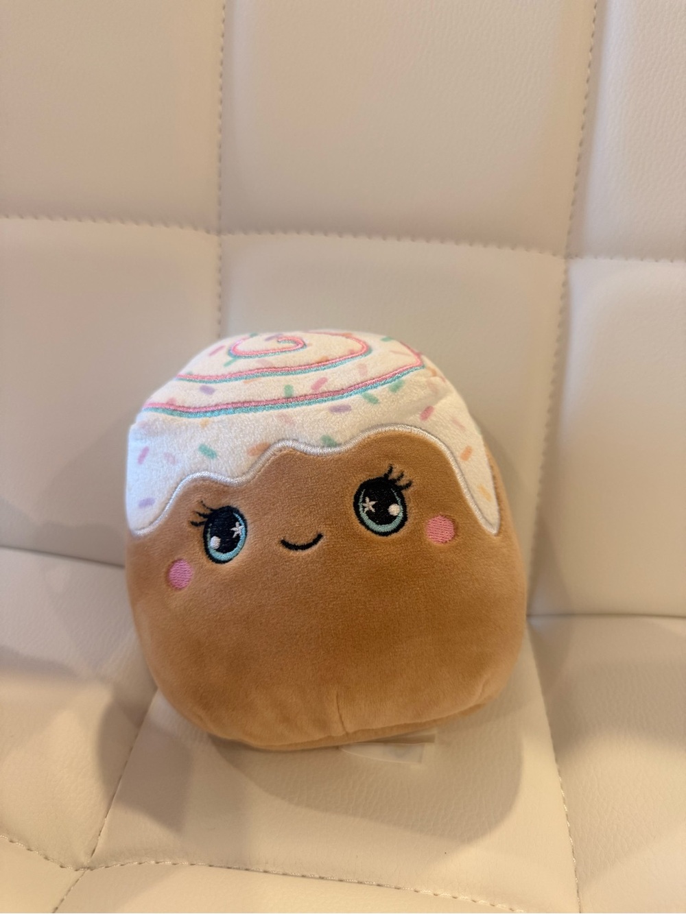 Squishmallows Cinnamon Roll Plush Pillow - Cream, Brown & Pink Accents